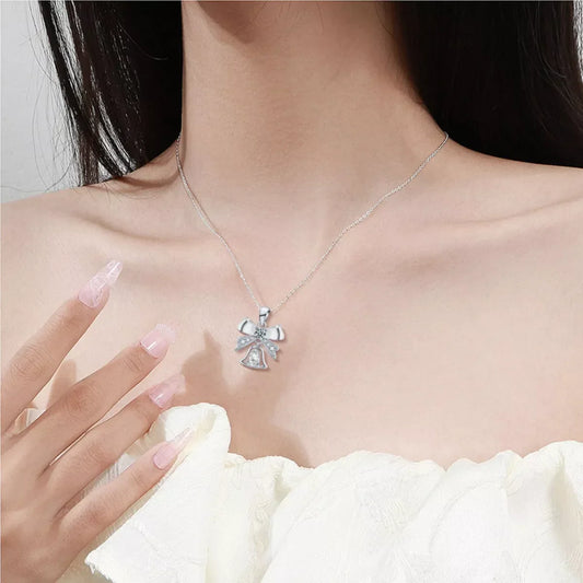 Sterling Silver Bow Pendant Necklace - 0.5 Carat Brilliance Velanci