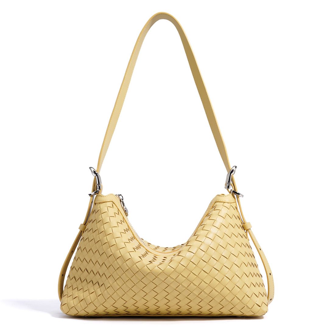 Velanci Luminous Crest Handbag: A Statement of Elegance