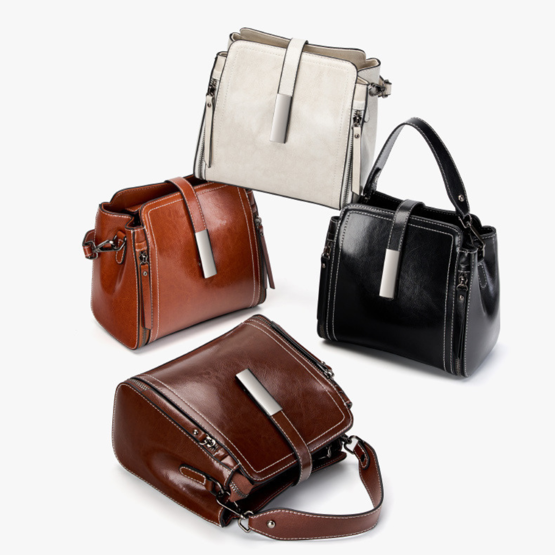 Velanci Ivory Belle Handbag: A Timeless Elegance