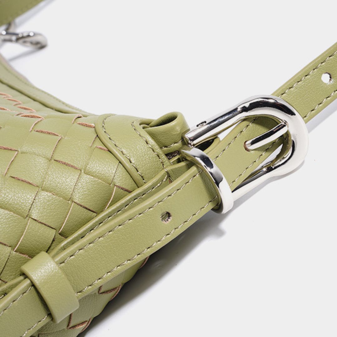 Velanci Luminous Crest Handbag: A Statement of Elegance