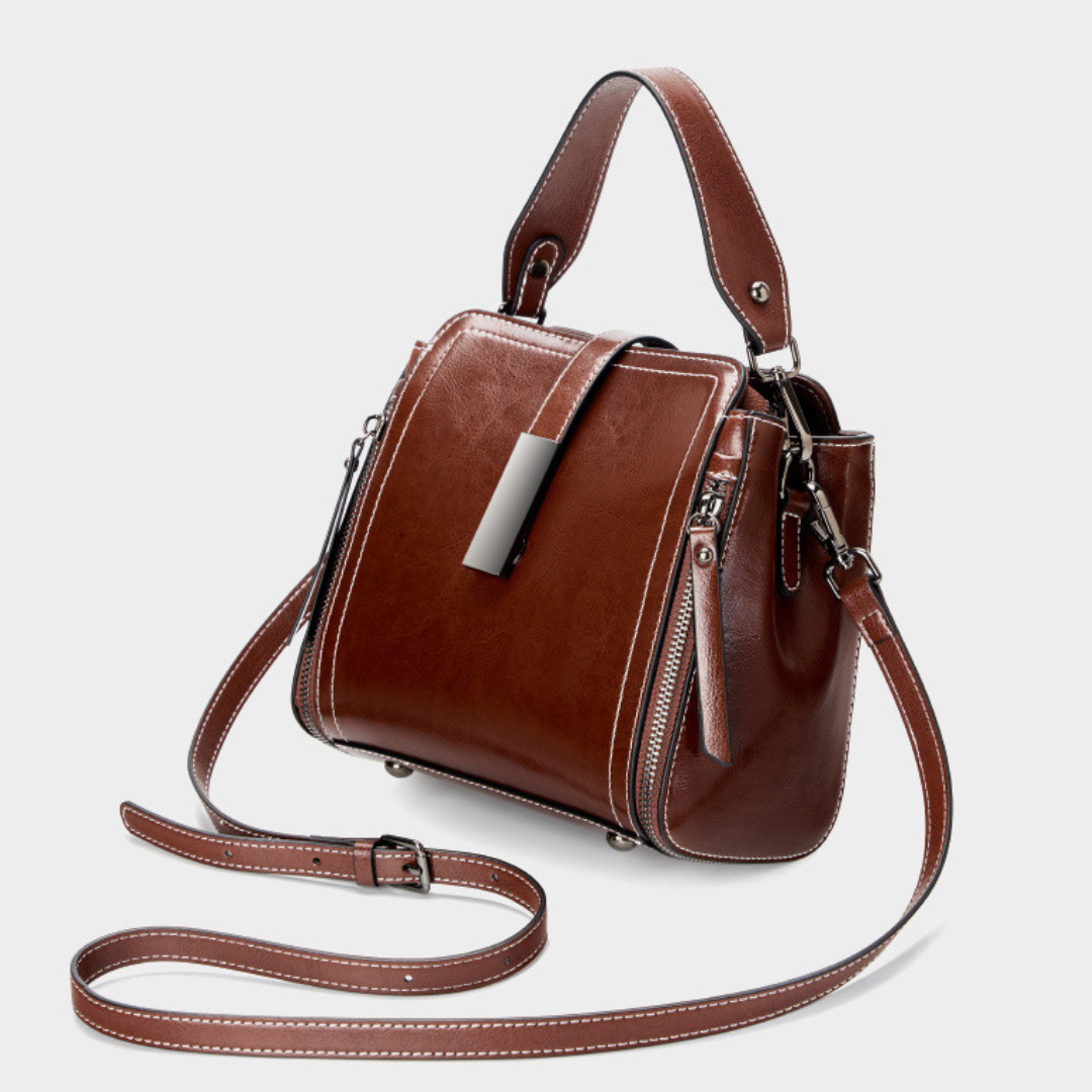 Velanci Ivory Belle Handbag: A Timeless Elegance