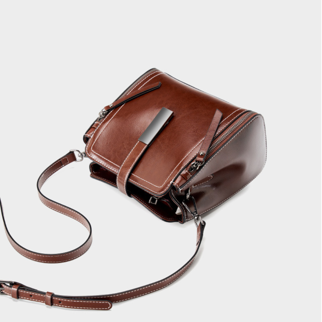 Velanci Ivory Belle Handbag: A Timeless Elegance