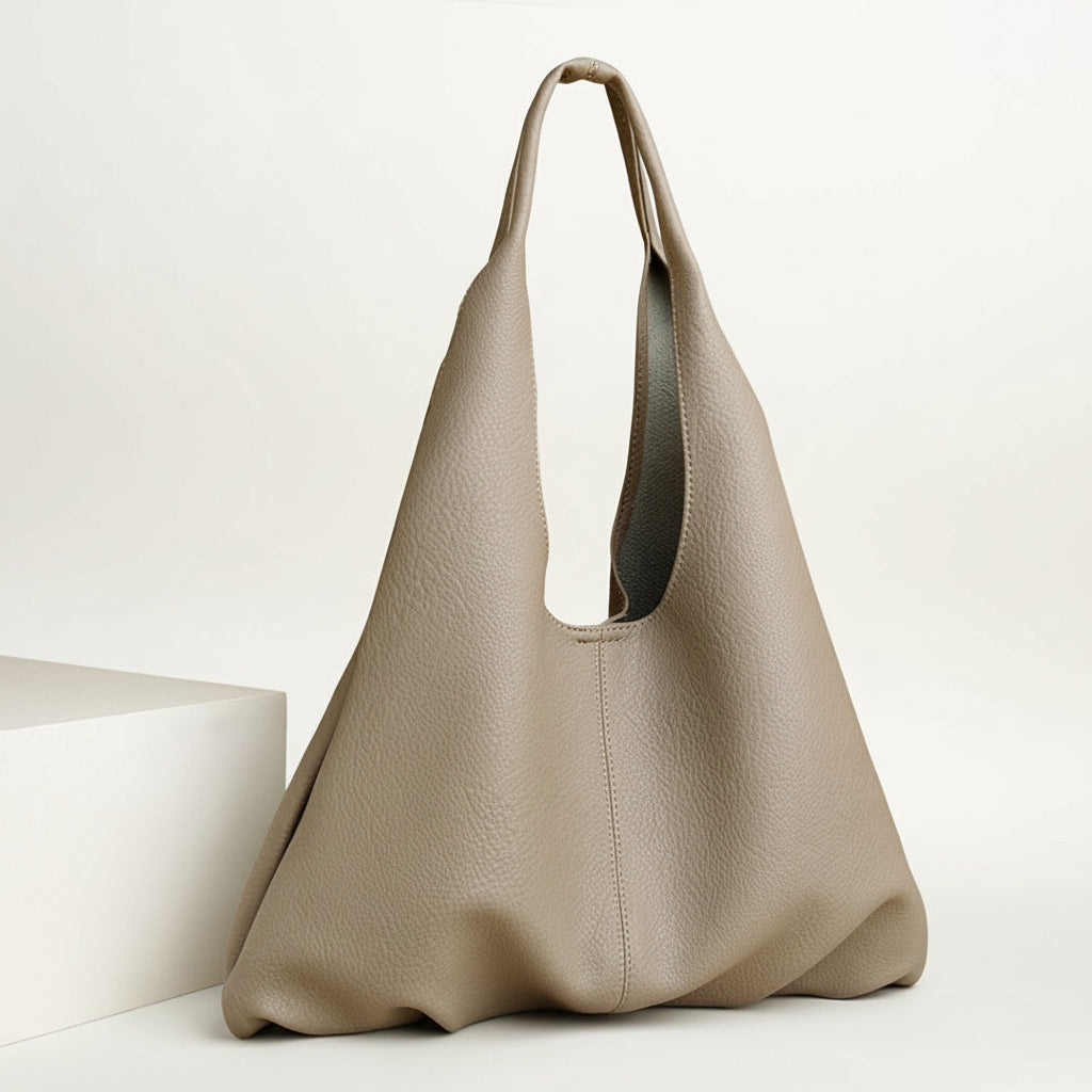 Beige handbag on a beige background