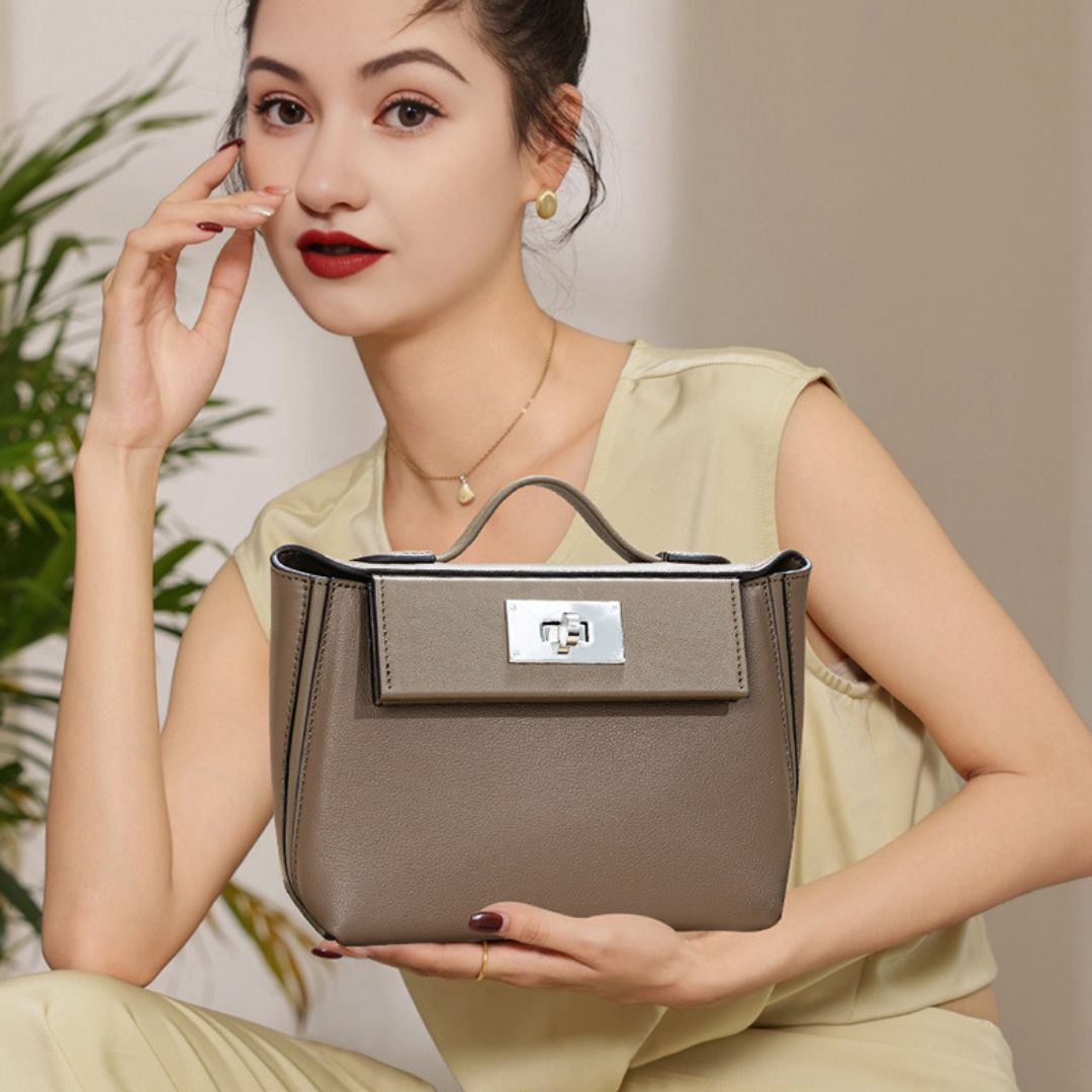 Velanci Ivory Empress Handbag: A Statement of Regal Elegance