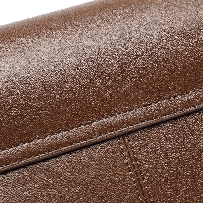 Vintage Luxe Leather Handbag with Buckle Accents