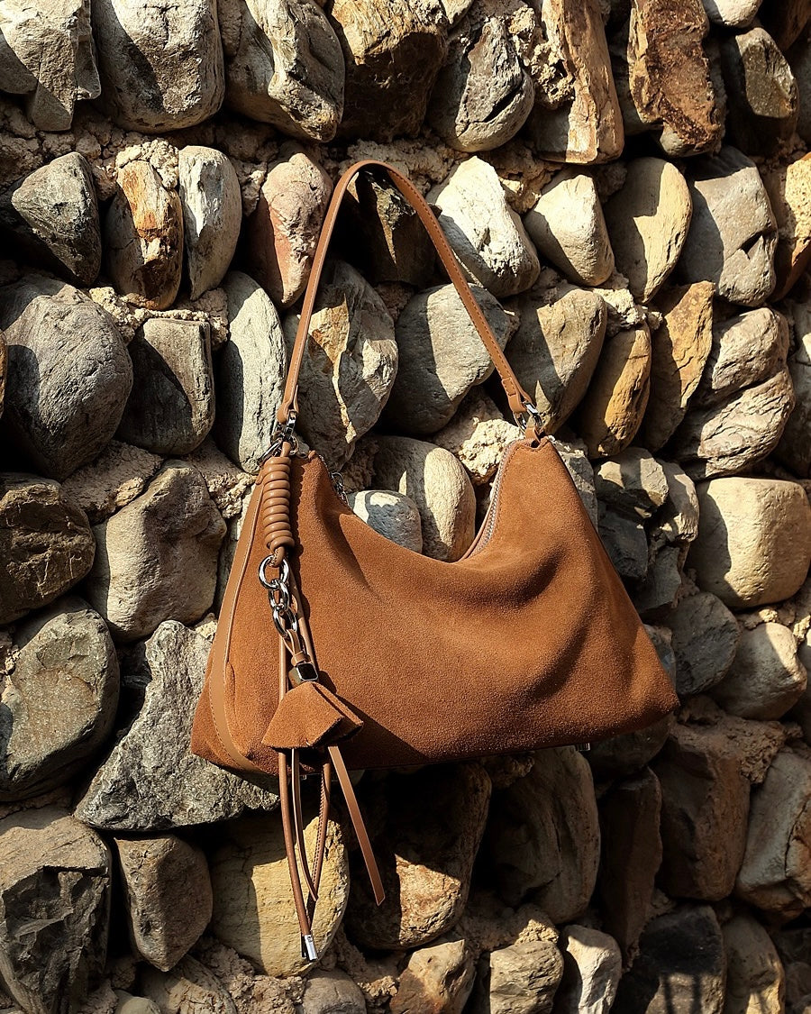 Suede Luxe Hobo Bag with Braided Elegance and Tassel Charm