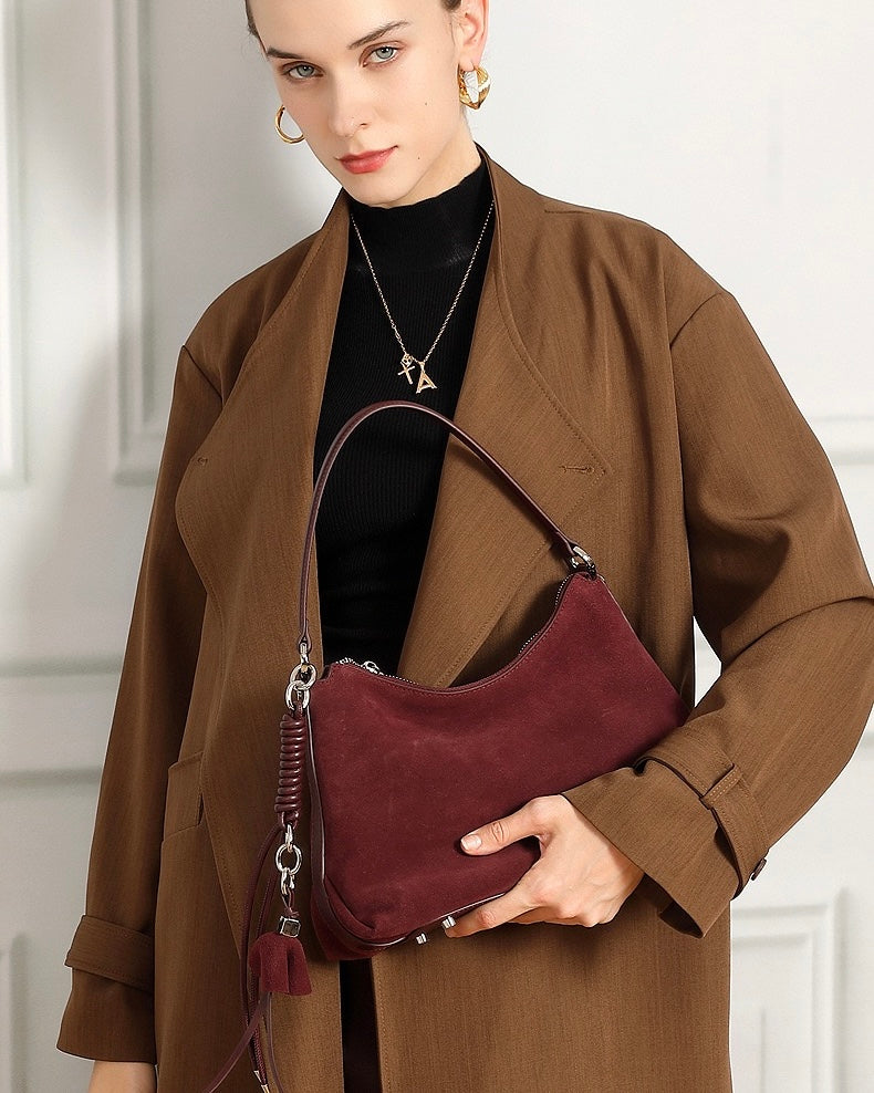Suede Luxe Hobo Bag with Braided Elegance and Tassel Charm