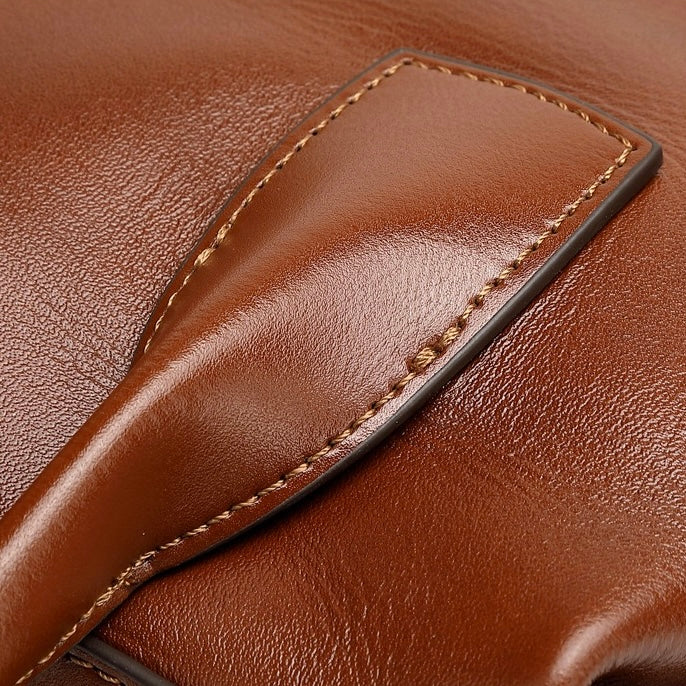 Luxurious Pebbled Leather Convertible Satchel with Elegant Top Handles