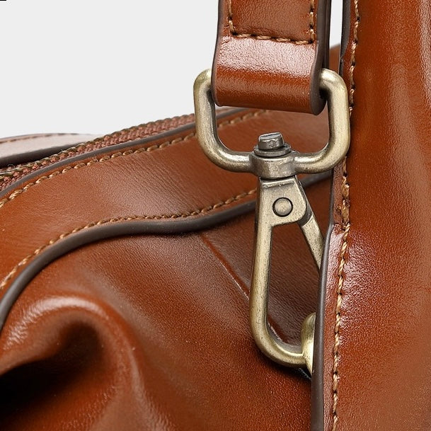 Luxurious Pebbled Leather Convertible Satchel with Elegant Top Handles