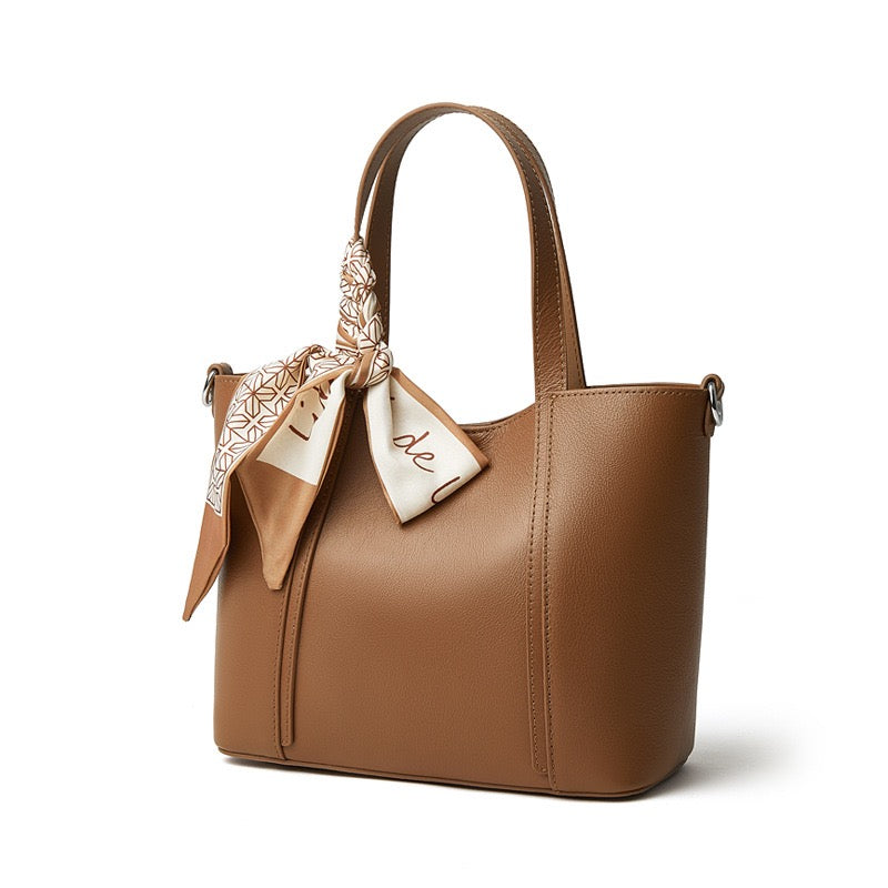 Elegant Leather Handbag with Signature Ribbon Detail