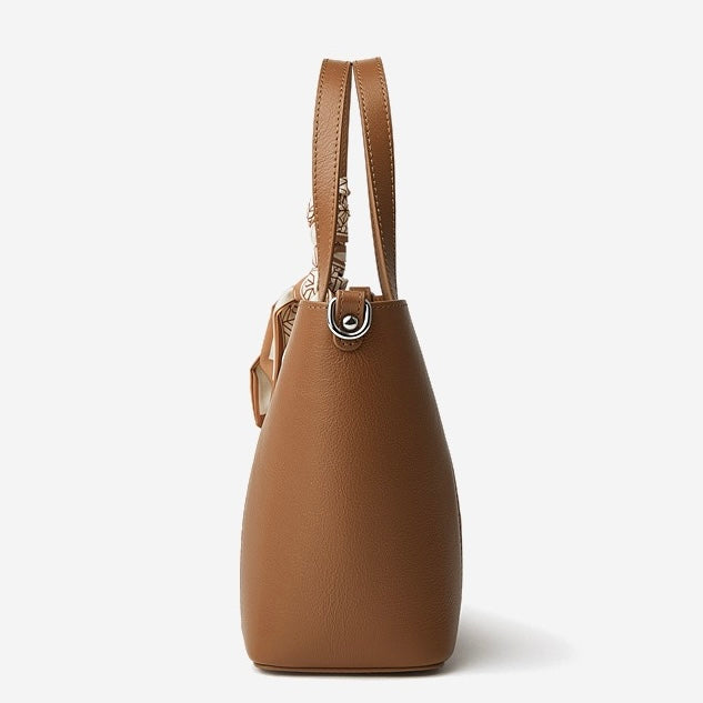 Elegant Leather Handbag with Signature Ribbon Detail