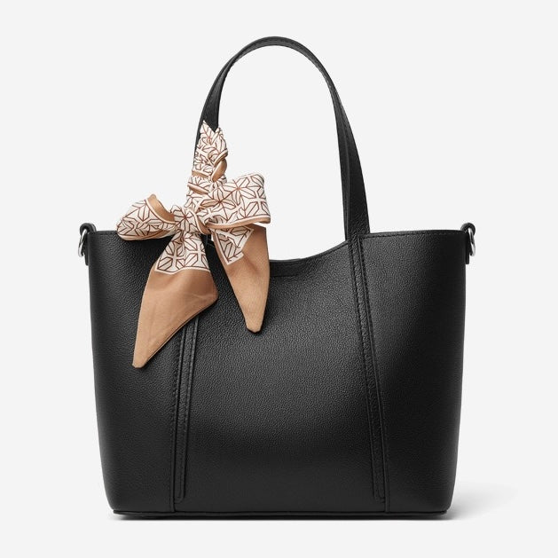 Elegant Leather Handbag with Signature Ribbon Detail