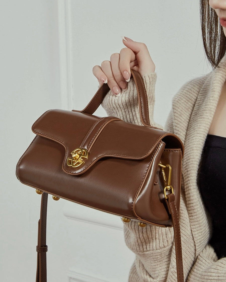Elegant Genuine Leather Top-Handle Bag with Gilded Lock Closure