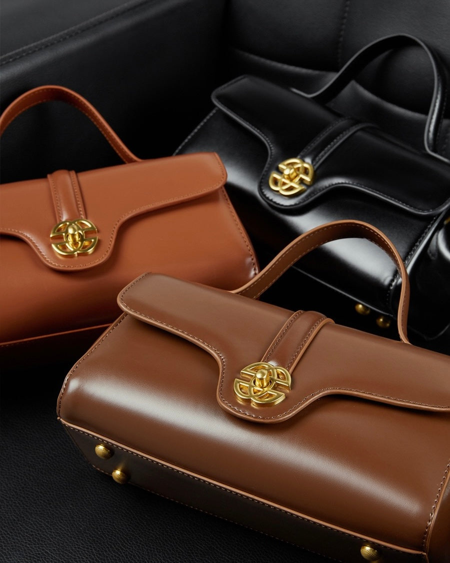 Elegant Genuine Leather Top-Handle Bag with Gilded Lock Closure