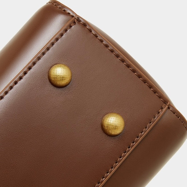 Elegant Genuine Leather Top-Handle Bag with Gilded Lock Closure