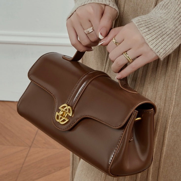 Elegant Genuine Leather Top-Handle Bag with Gilded Lock Closure