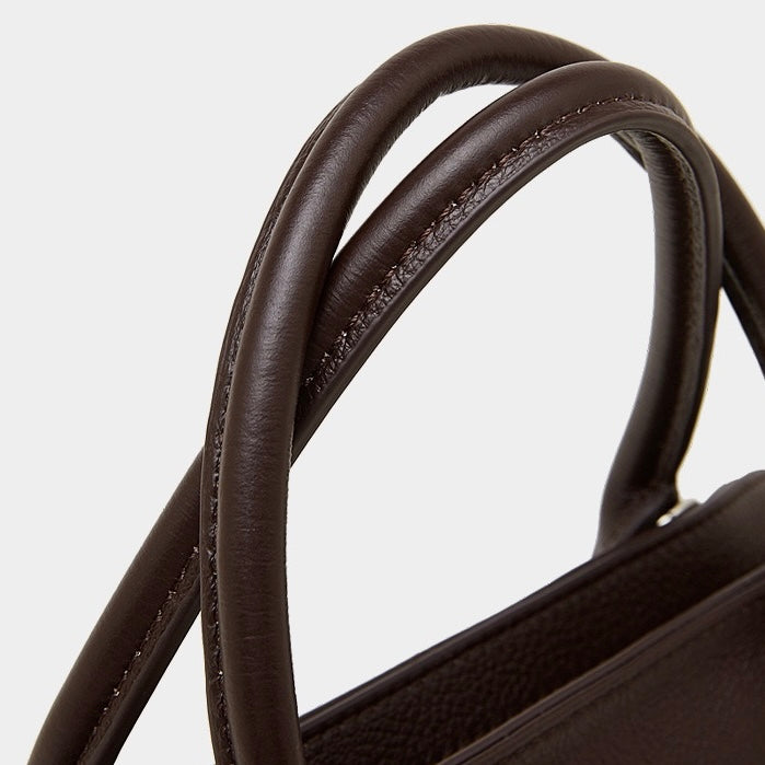 Grained Leather Dome Satchel: A Fusion of Elegance and Functionality