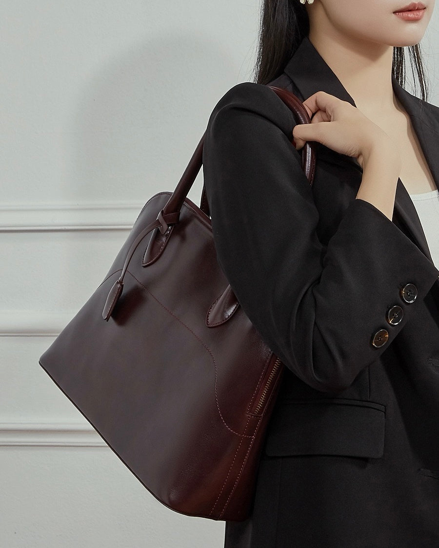 Genuine Leather Dome Satchel with Signature Tassel - Timeless Elegance