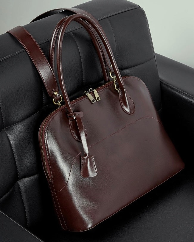 Genuine Leather Dome Satchel with Signature Tassel - Timeless Elegance