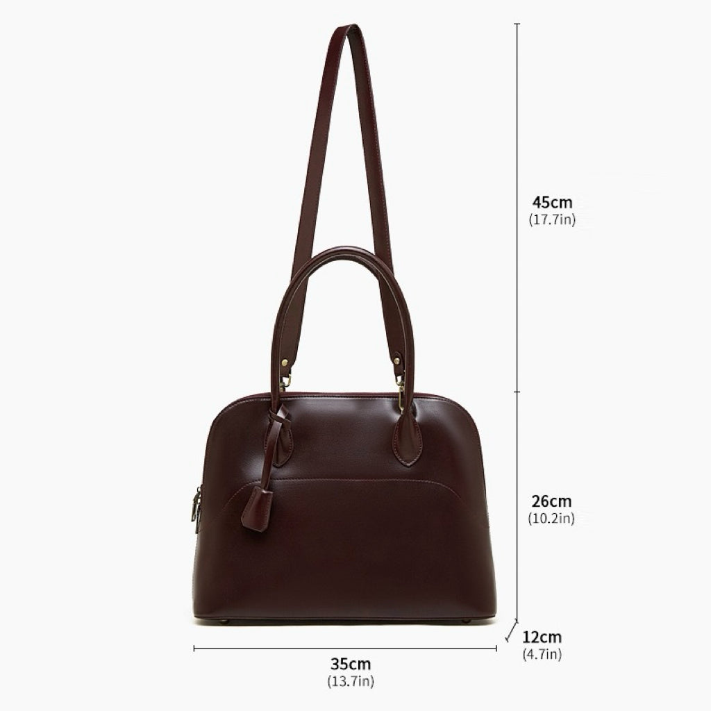 Genuine Leather Dome Satchel with Signature Tassel - Timeless Elegance