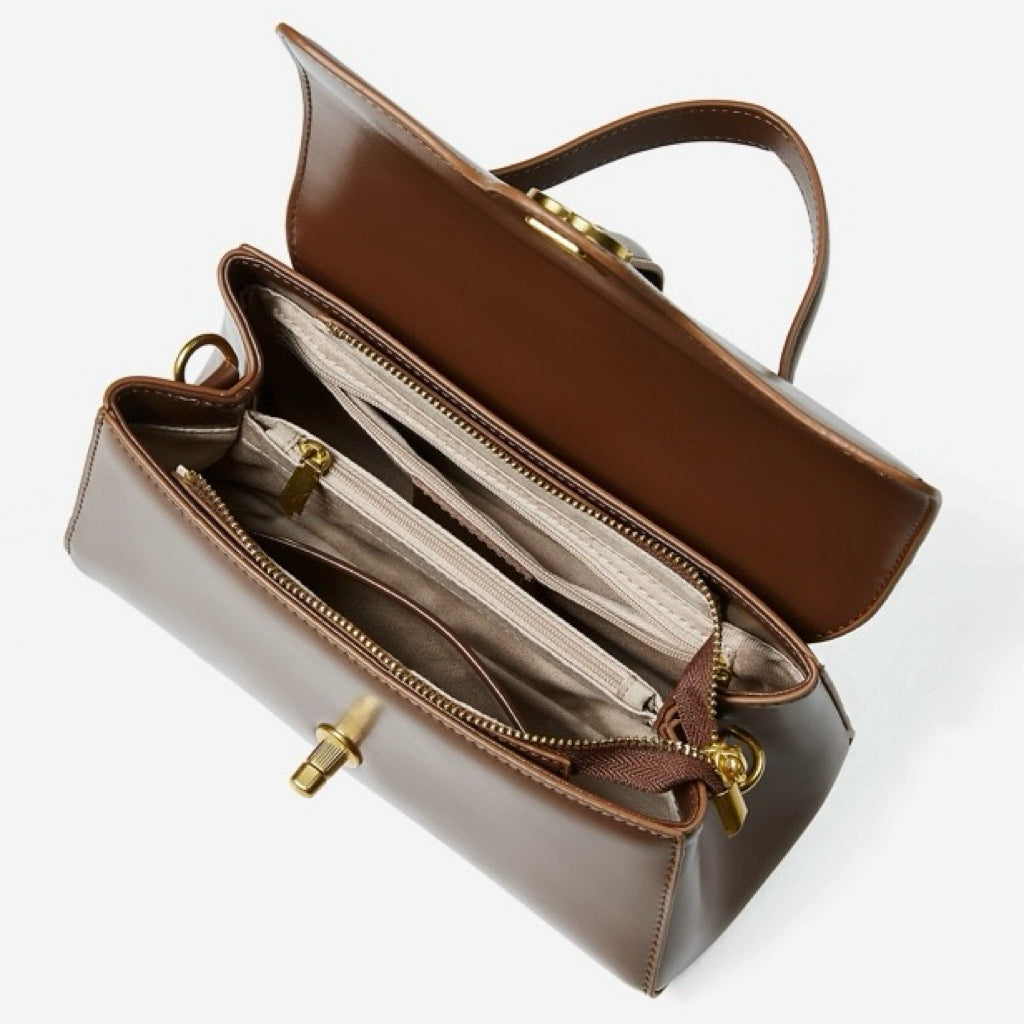 Elegant Genuine Leather Top-Handle Bag with Gilded Lock Closure