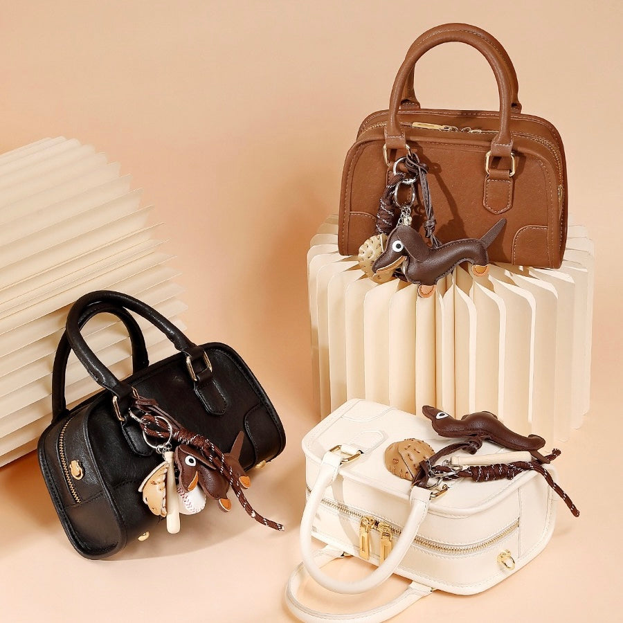 Chic Genuine Leather Boston Crossbody Bag with Whimsical Dachshund Pendant