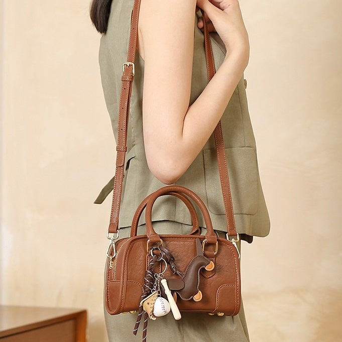 Chic Genuine Leather Boston Crossbody Bag with Whimsical Dachshund Pendant