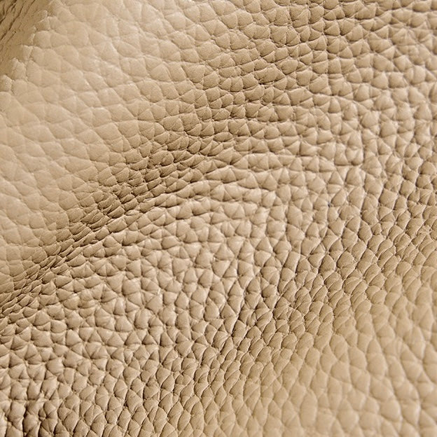 Elegant Leather Bucket Bag with Charming Elephant Pendant