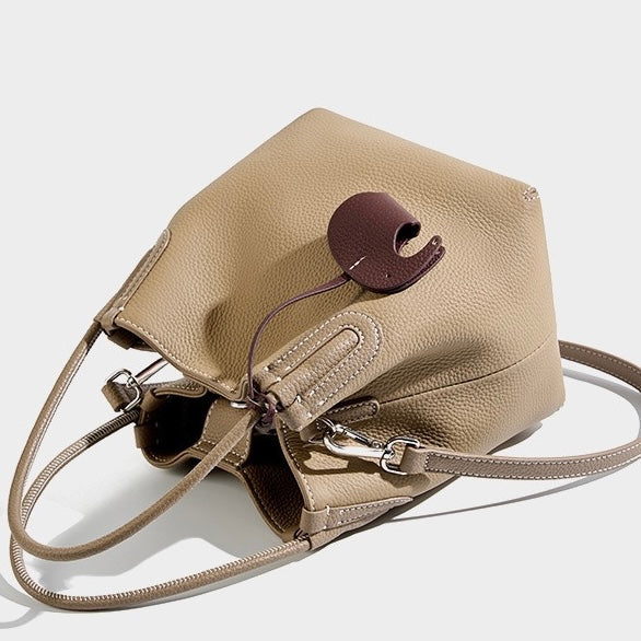Elegant Leather Bucket Bag with Charming Elephant Pendant