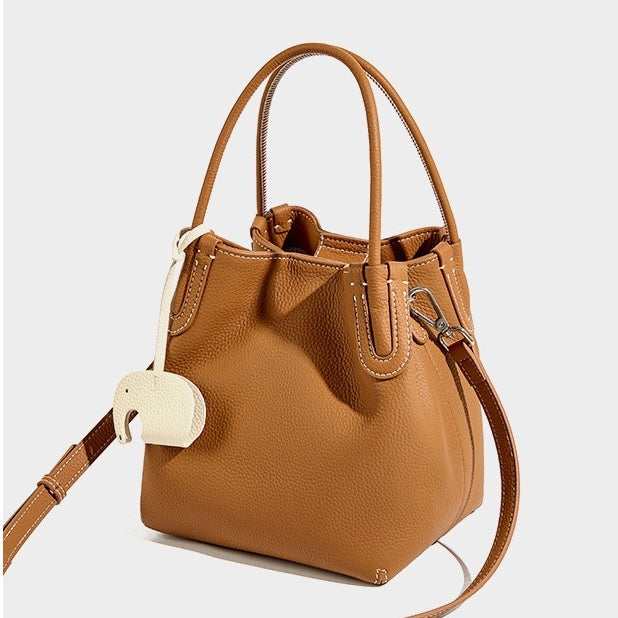 Elegant Leather Bucket Bag with Charming Elephant Pendant