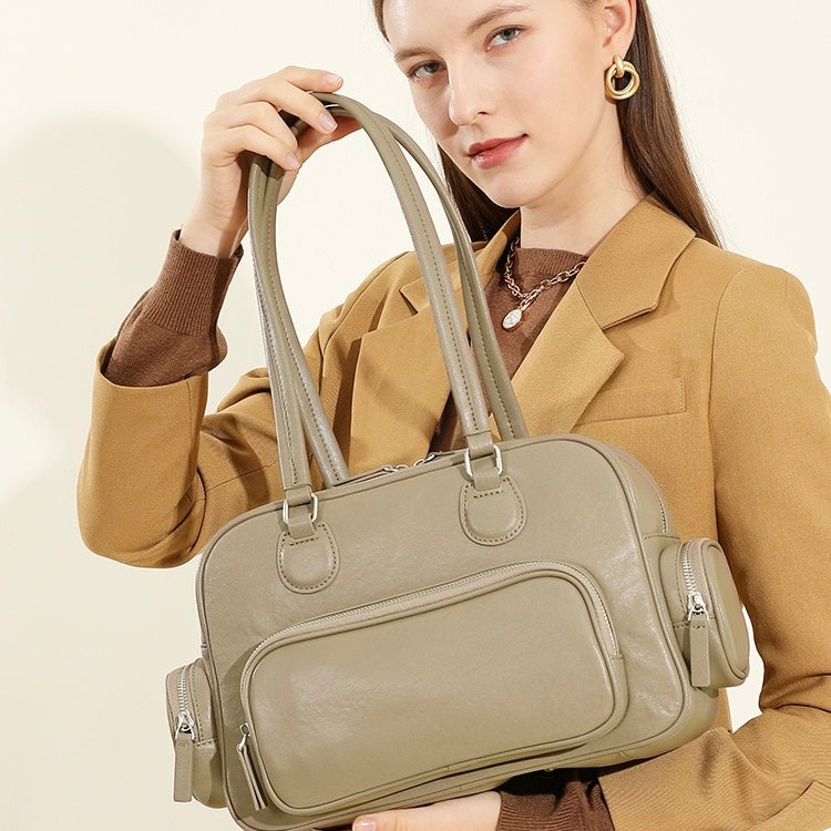 Vintage Genuine Leather Bowling Handbag with Sophisticated Side Pockets