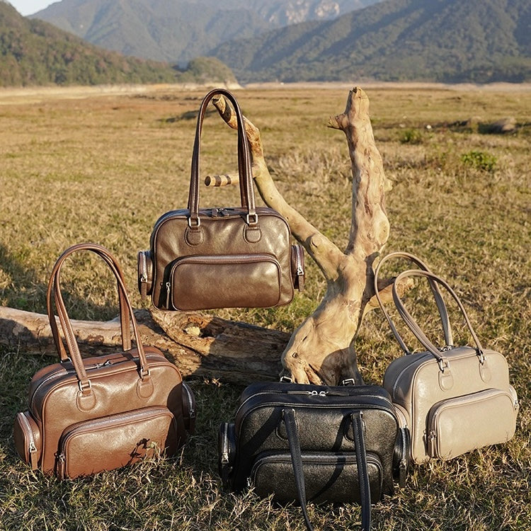 Vintage Genuine Leather Bowling Handbag with Sophisticated Side Pockets