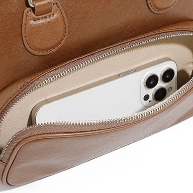 Vintage Genuine Leather Bowling Handbag with Sophisticated Side Pockets