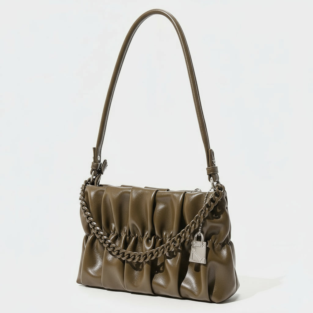 Brown handbag with a chain detail on a white background