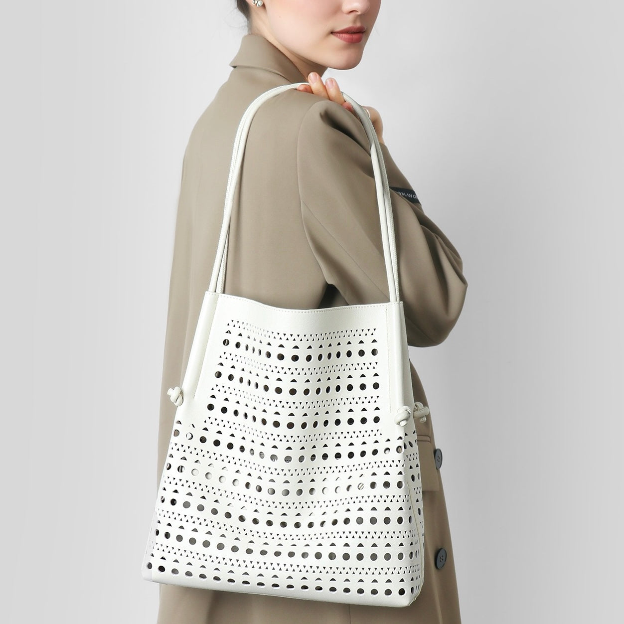 Elegant Genuine Leather Perforated Tote Bag with Detachable Pouch