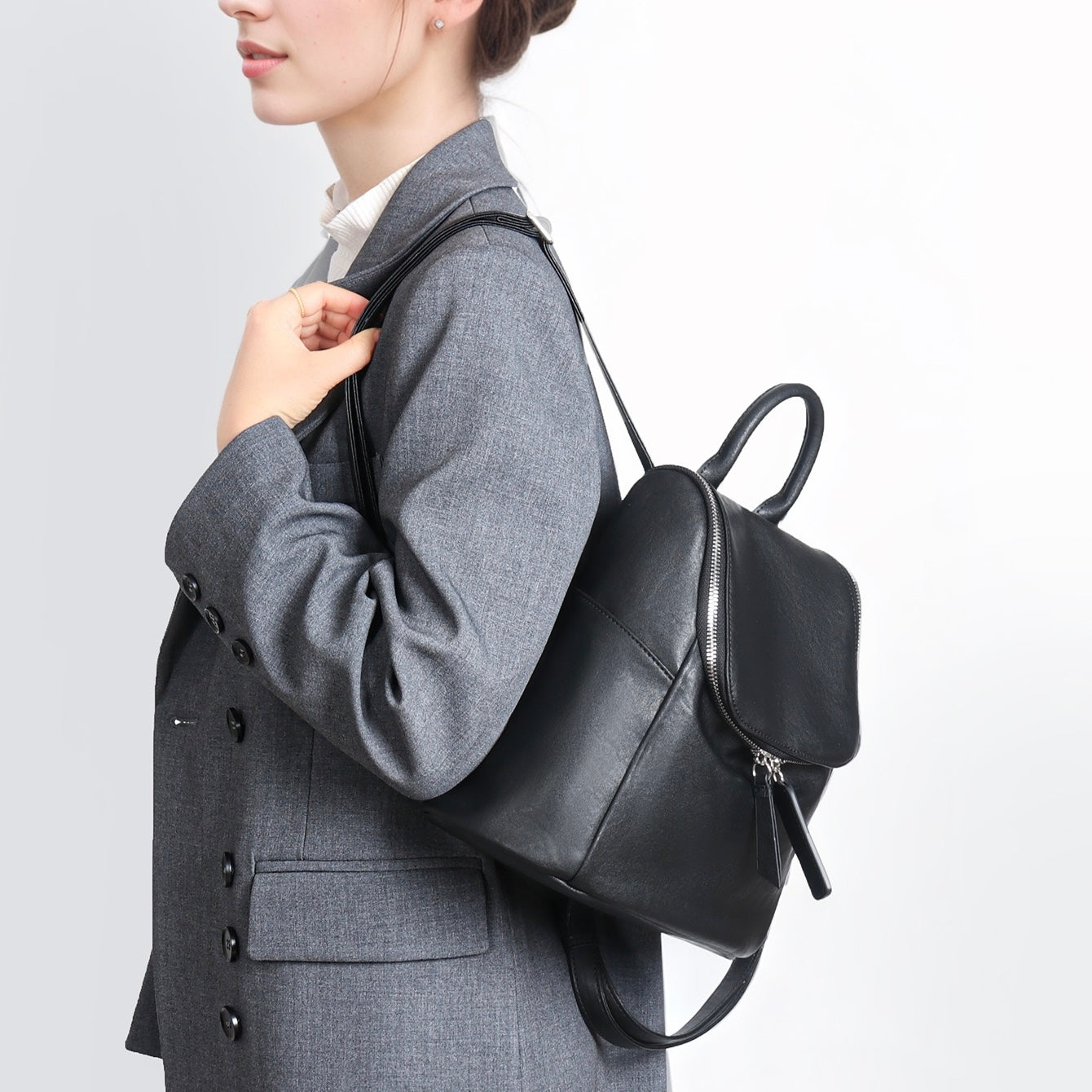 Elegance Redefined: Minimalist Creamy Leather Backpack