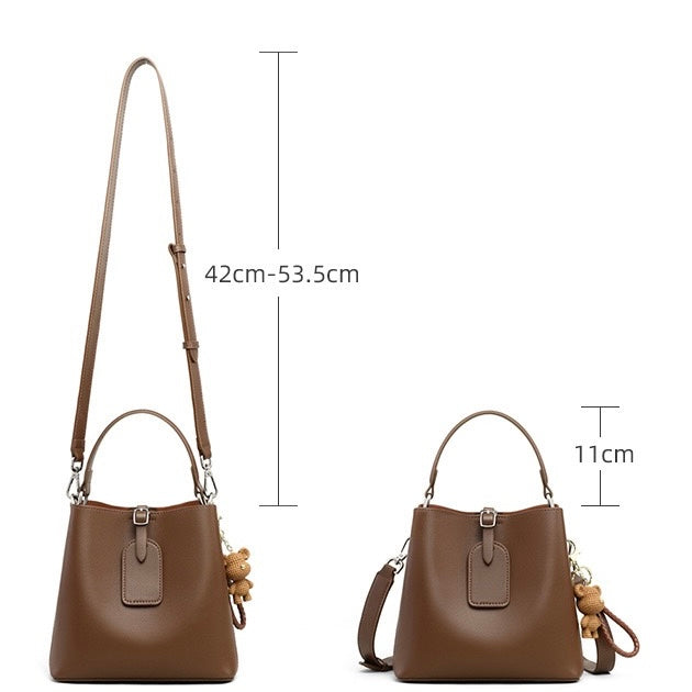 Coffee Genuine Leather Bucket Bag with Charming Bear Accent