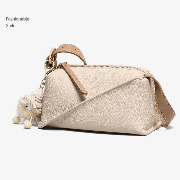 Chic Geometric Leather Crossbody Bag with Plush Charm