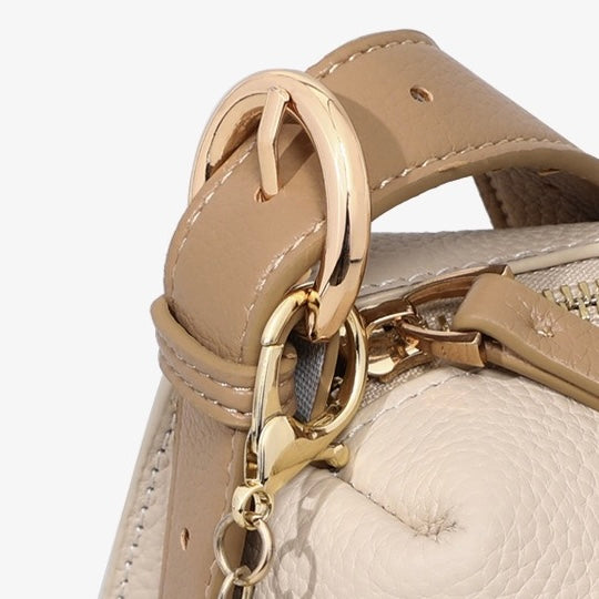 Chic Geometric Leather Crossbody Bag with Plush Charm