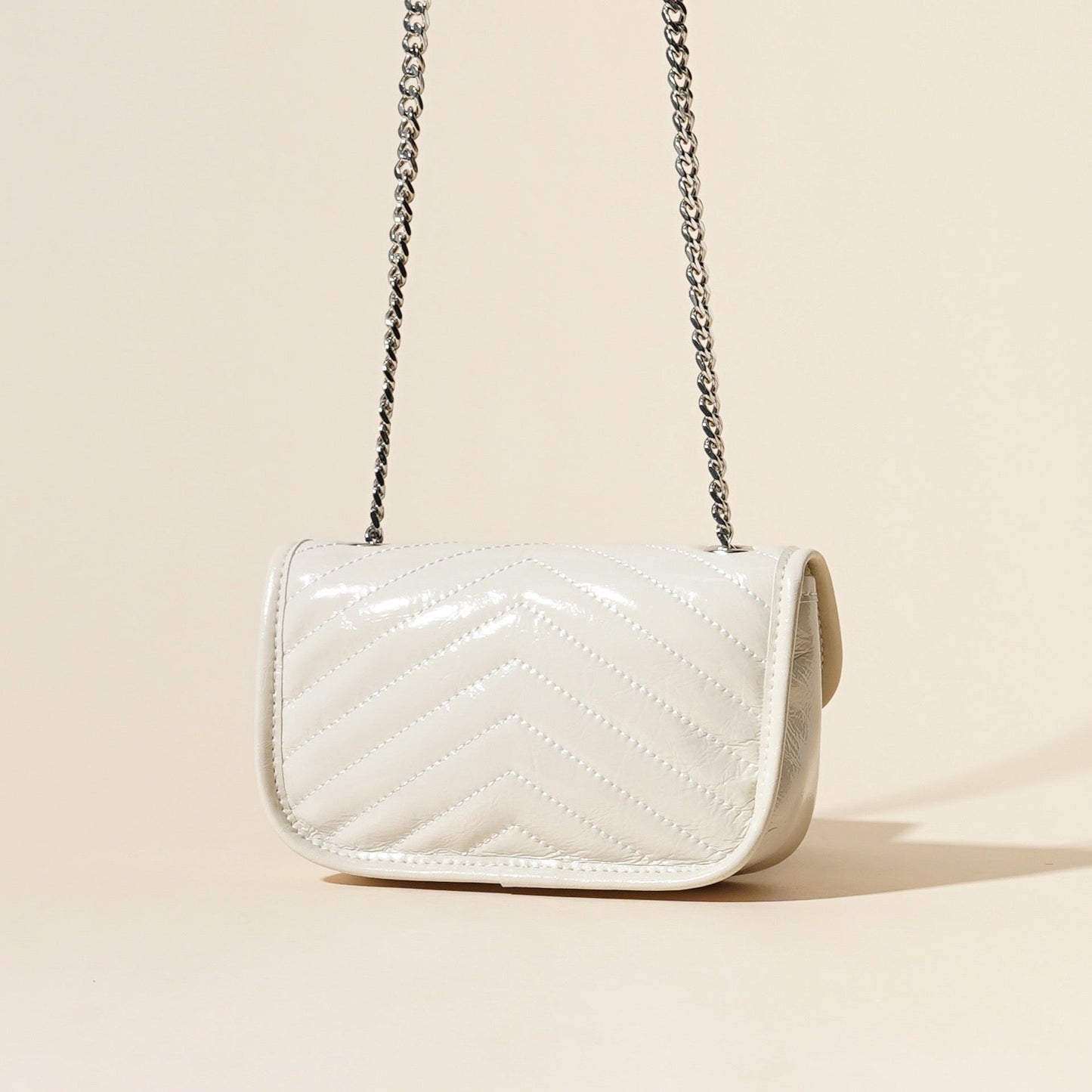 Elegant Mini Flap Bag in Genuine Leather with Silver Chain