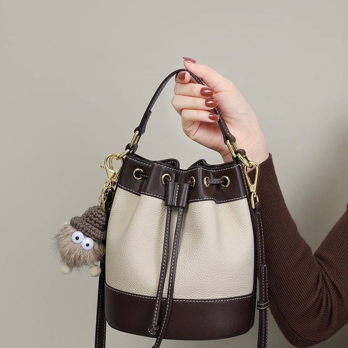 Genuine Leather Pendant Bucket Handbag – Creamy White Elegance