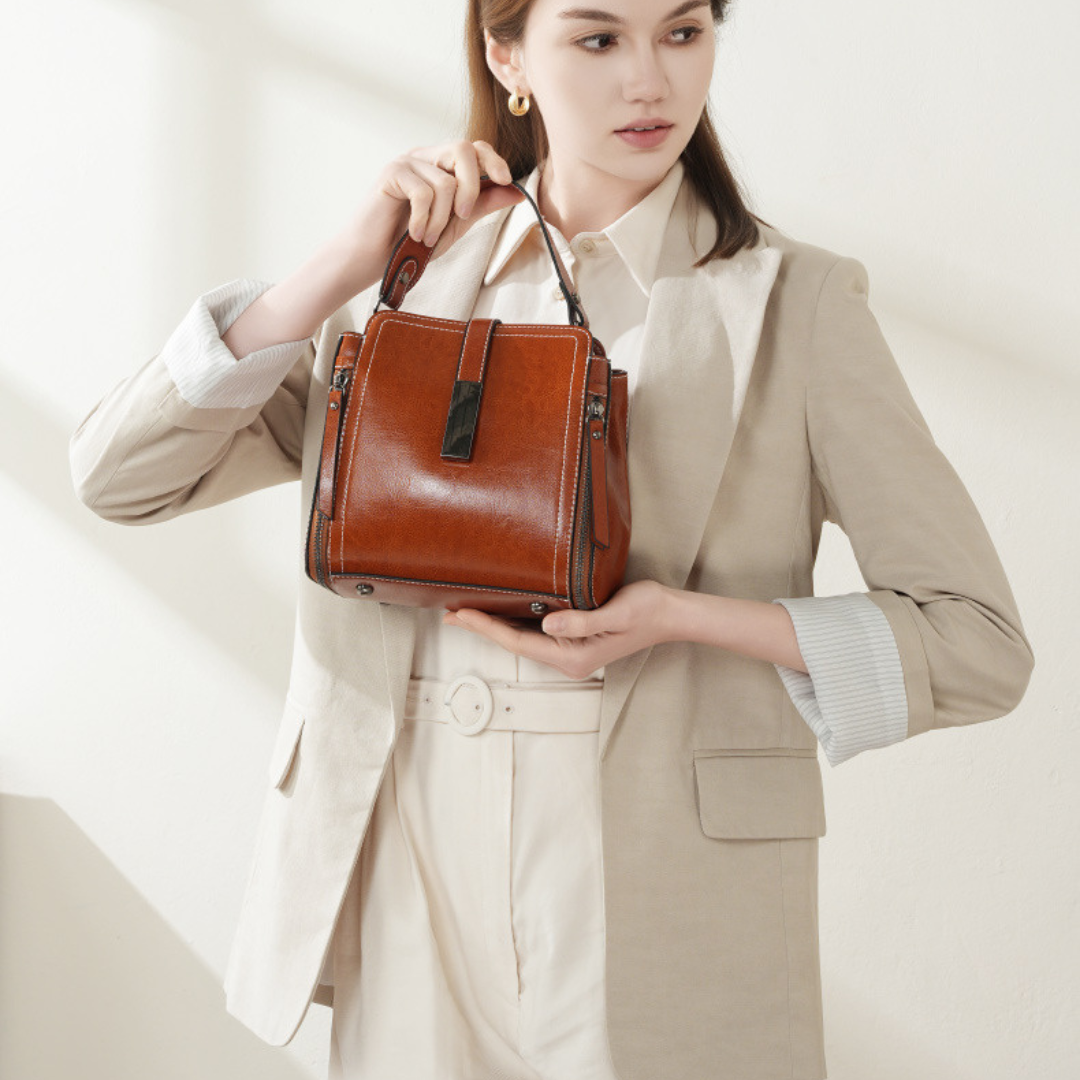 Velanci Ivory Belle Handbag: A Timeless Elegance