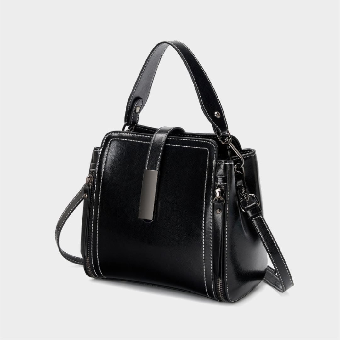 Velanci Ivory Belle Handbag: A Timeless Elegance