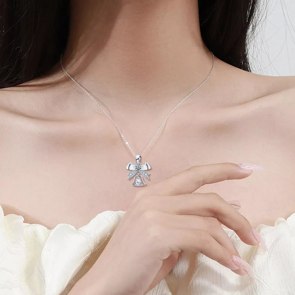 Sterling Silver Bow Pendant Necklace - 0.5 Carat Brilliance Velanci
