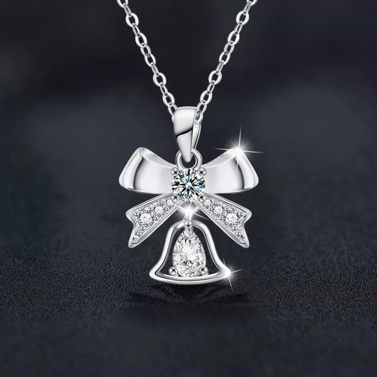 Sterling Silver Bow Pendant Necklace - 0.5 Carat Brilliance Velanci