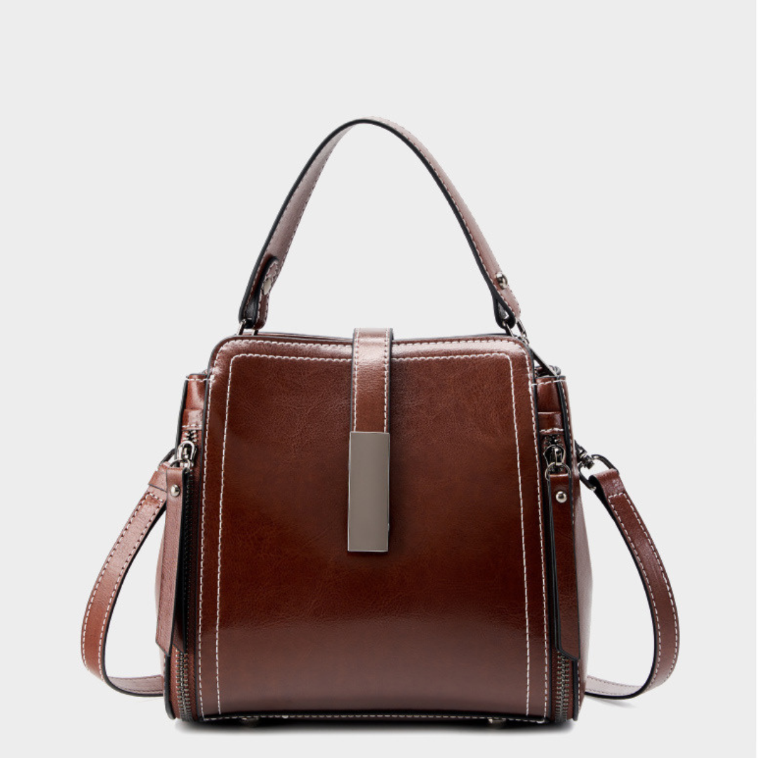 Velanci Ivory Belle Handbag: A Timeless Elegance