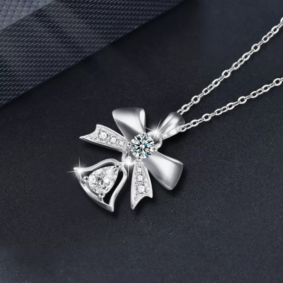 Sterling Silver Bow Pendant Necklace - 0.5 Carat Brilliance Velanci