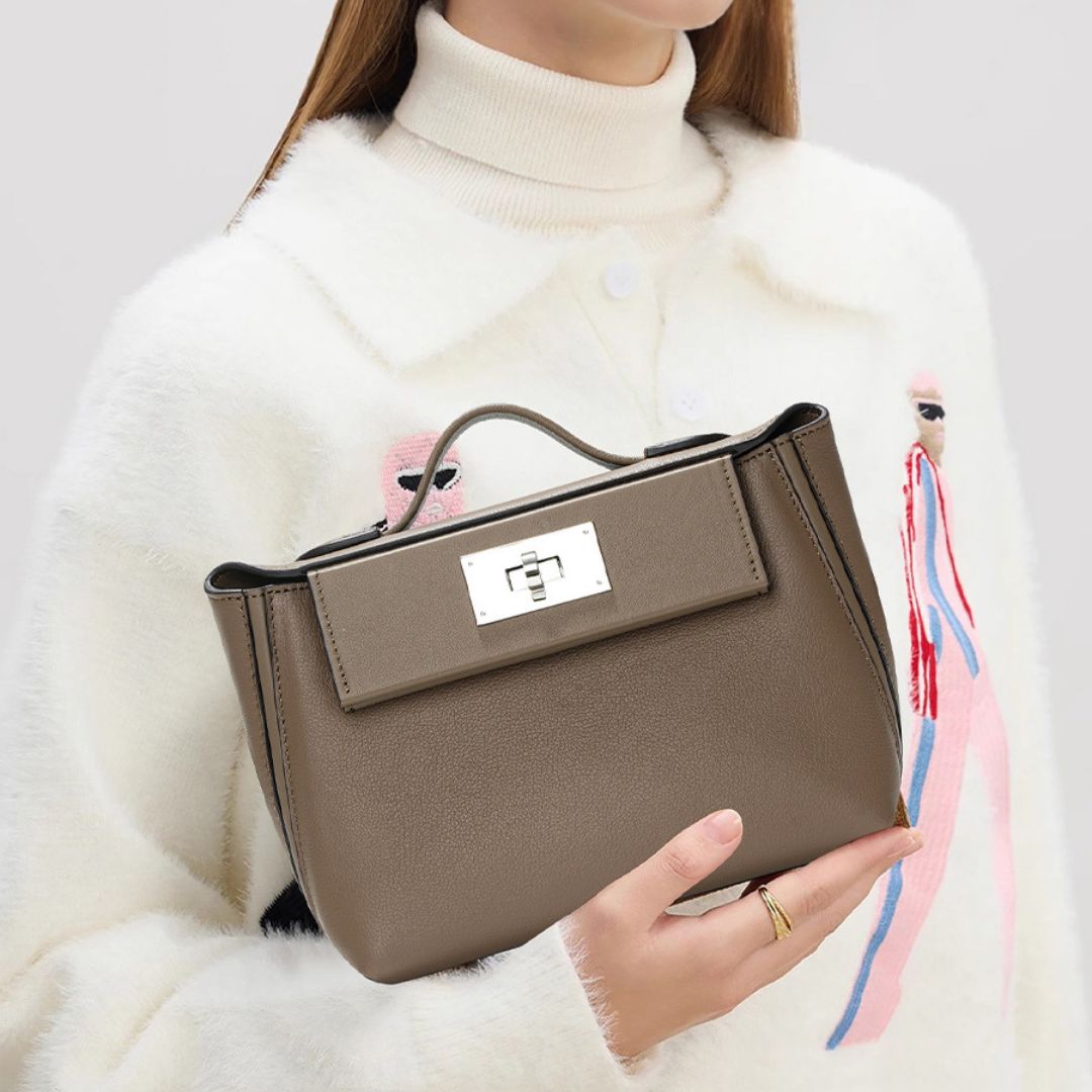 Velanci Ivory Empress Handbag: A Statement of Regal Elegance