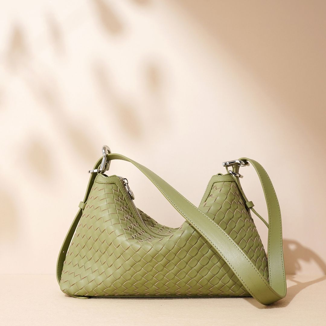 Velanci Luminous Crest Handbag: A Statement of Elegance