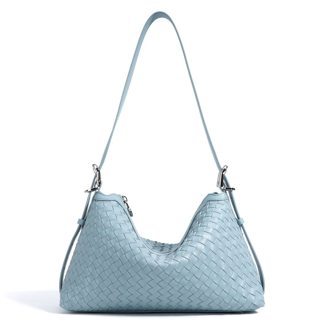 Velanci Luminous Crest Handbag: A Statement of Elegance